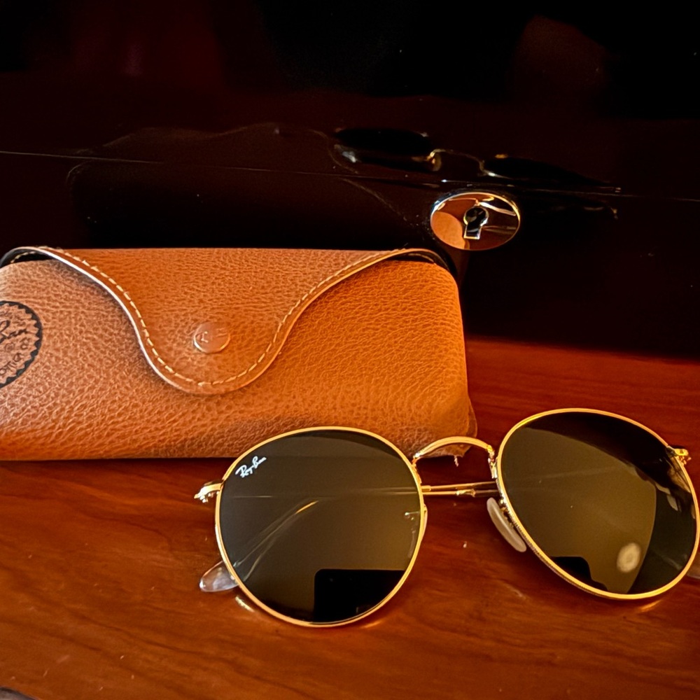 RayBan sunglasses. Black and gold. Like new Ray-ban